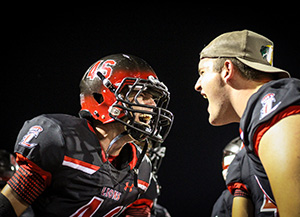 Two football players celebrate